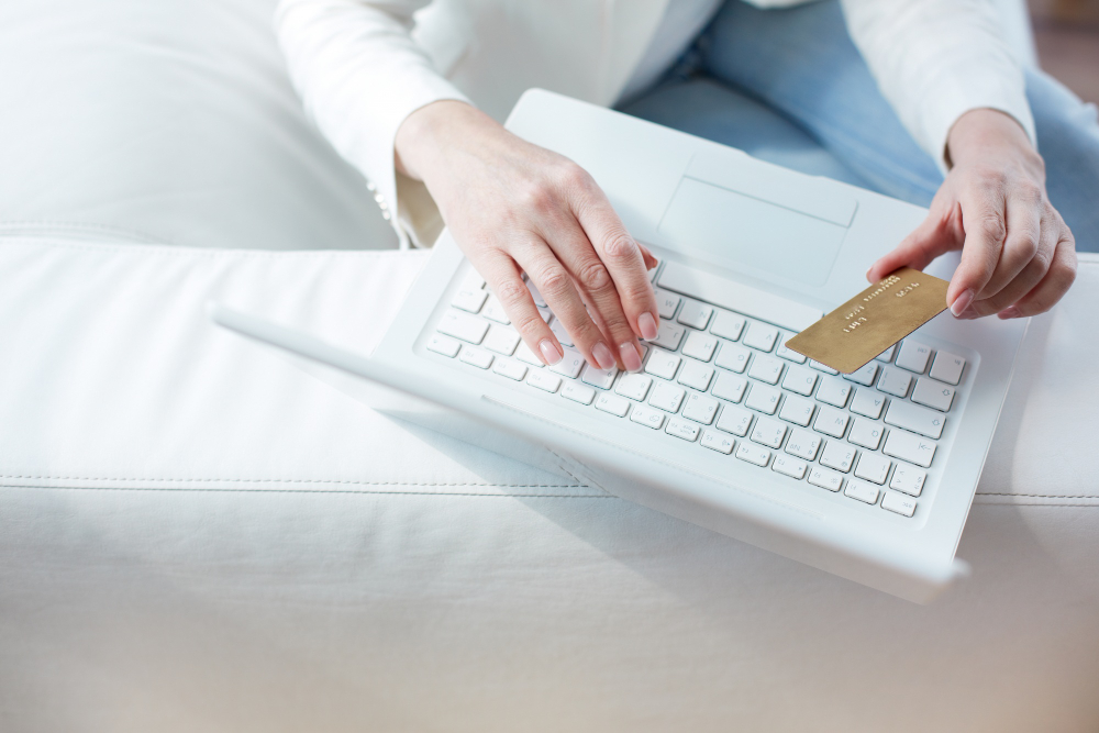 Close-up of Female Hands Making Online Payment