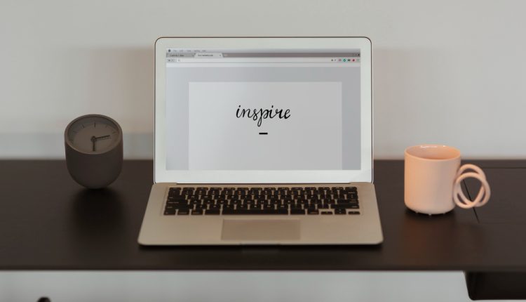 Inspire Written on a Laptop Screen